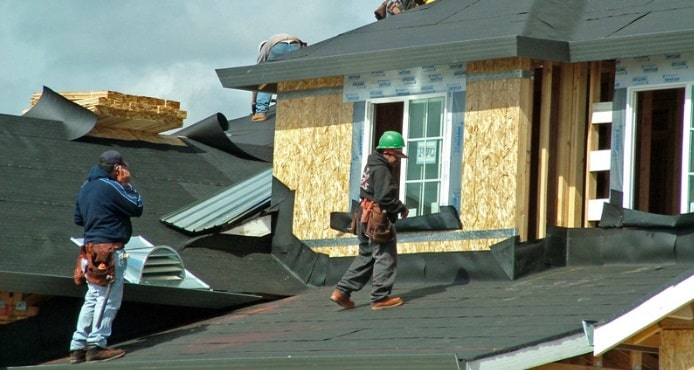 Affordable Roofing installs underlayment.