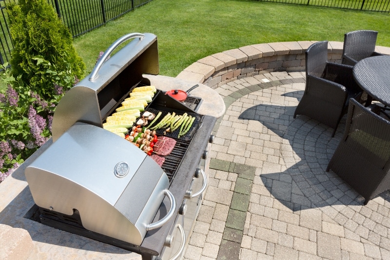 Grilling food on an outdoor gas barbecue